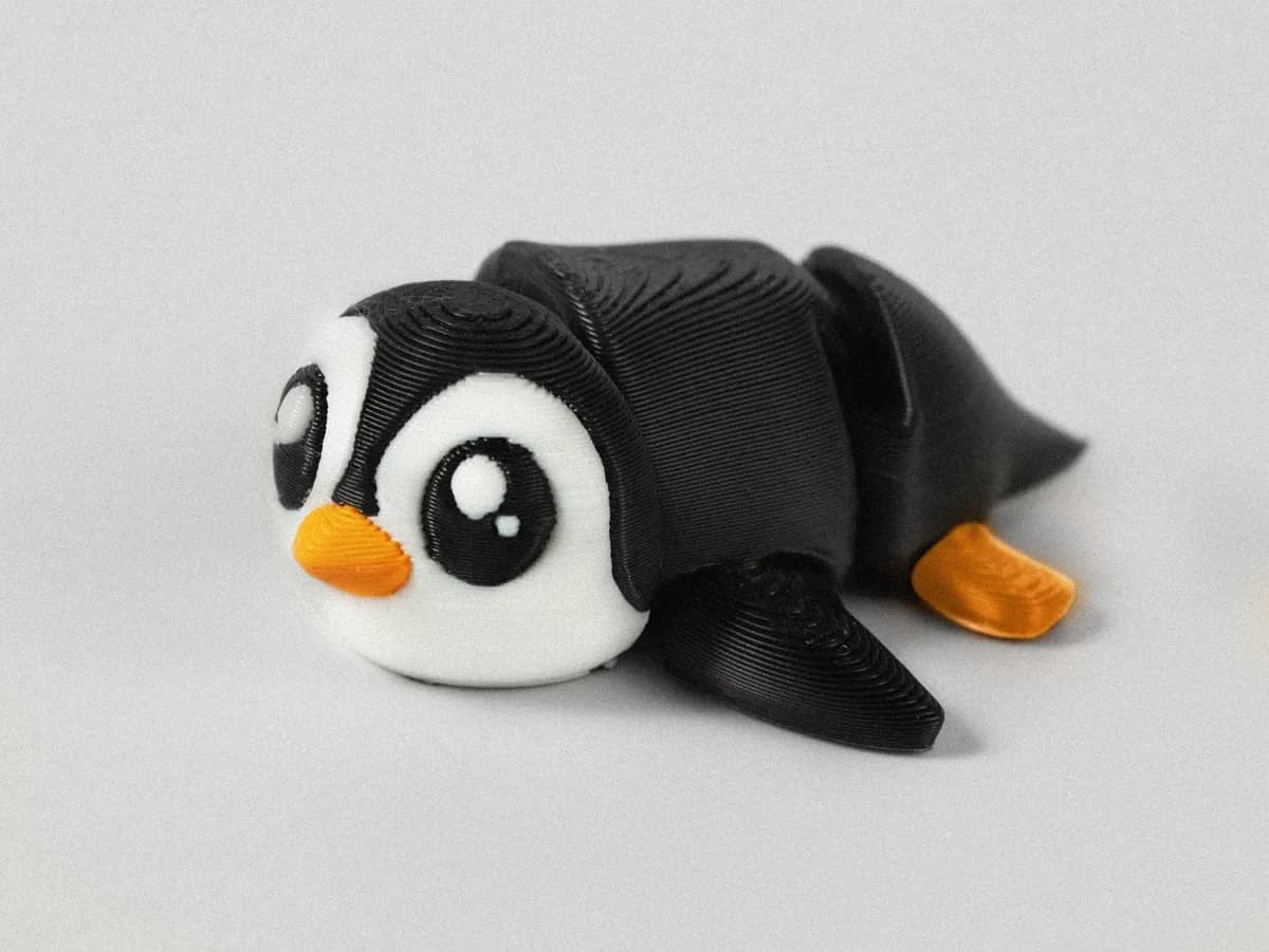 Pinguim Tuxi Articulado
